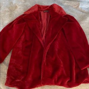 Red faux fur coat